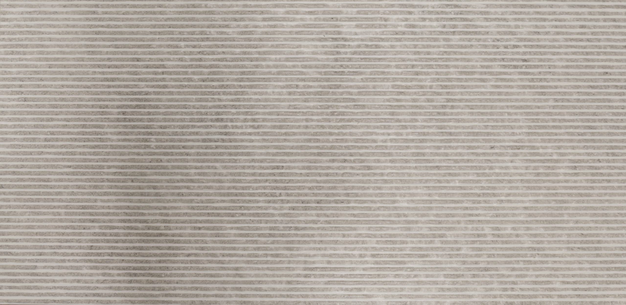 Stratus1 - A beautifully designed marble tile showcasing elegant veining patterns and a soft, muted color palette.