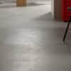 Concrete tile with a textured surface and a grey color