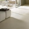 Image of a gray concrete floor with a rough texture and a modern aesthetic