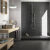 Light gray rectangular ceramic tiles with an intricate pattern design.