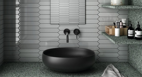 The for this image A colorful palette of tiles displayed in a showroom