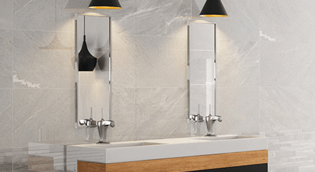 Image of a tile and stone gallery's blog thumbnail featuring various tile designs and textures.