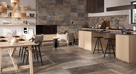 Image of a beautifully designed kitchen featuring modern countertops, sleek cabinetry, and stylish pendant lights.