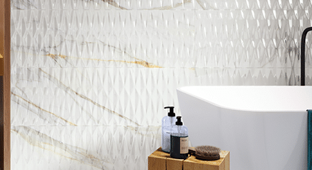 Blog Thumbnail Image - A close-up view of various tiles and stones, showcasing their colors, textures, and patterns.