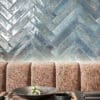 Vesta Blue tile stacked neatly, showcasing its vibrant blue hue and textured surface.