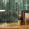Vesta Emerald 2 - a vibrant green ceramic tile with a glossy finish.
