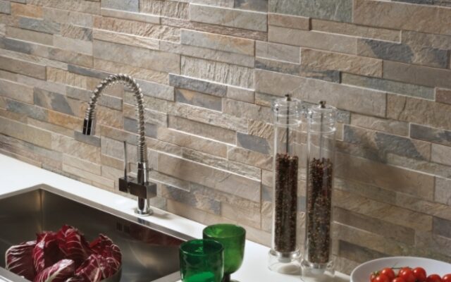 An alternating pattern of tiles in nuanced shades and textures showcased in a modern interior design.