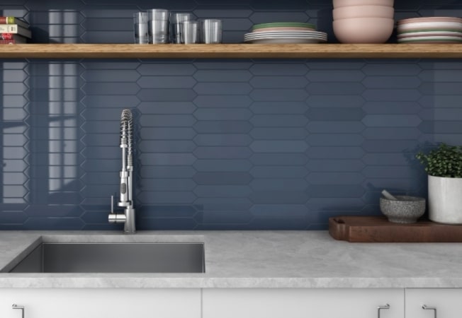 Contemporary white and grey tile pattern on a bathroom wall